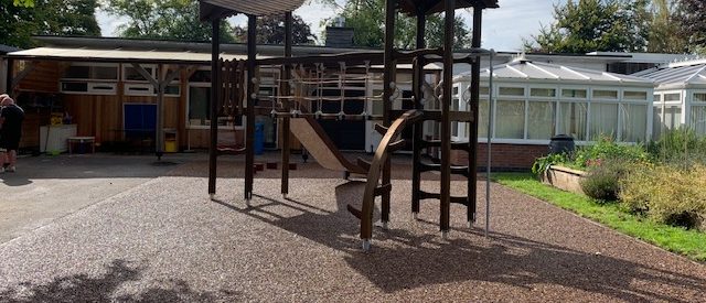 wooden climbing frame in c of e primary school