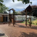 side view of wooden climbing frame in hampton lucy primary school