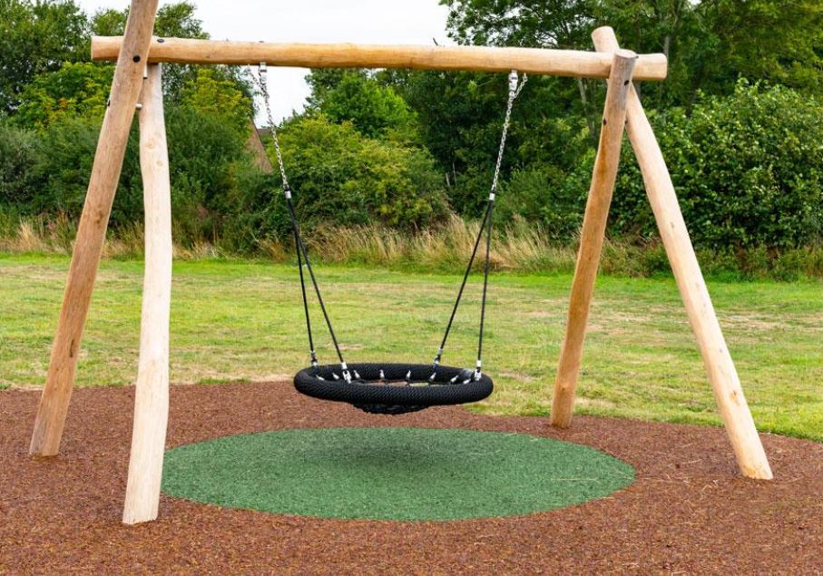 TigerMulch bonded rubber mulch under swing