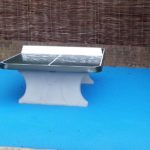 outdoor table tennis table on wet pour rubber surface