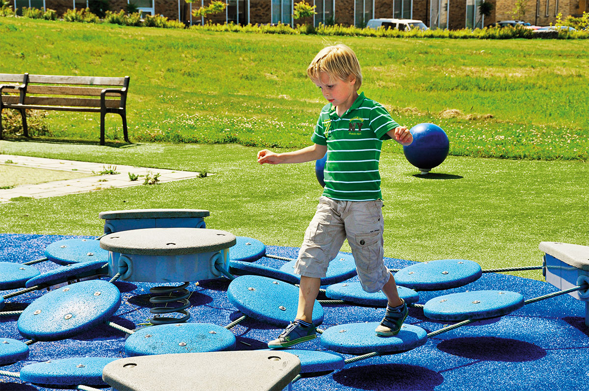 wobbling rubber stepping post in park