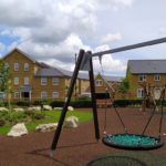 basket swing in kent on rubber mulch safety surfacing
