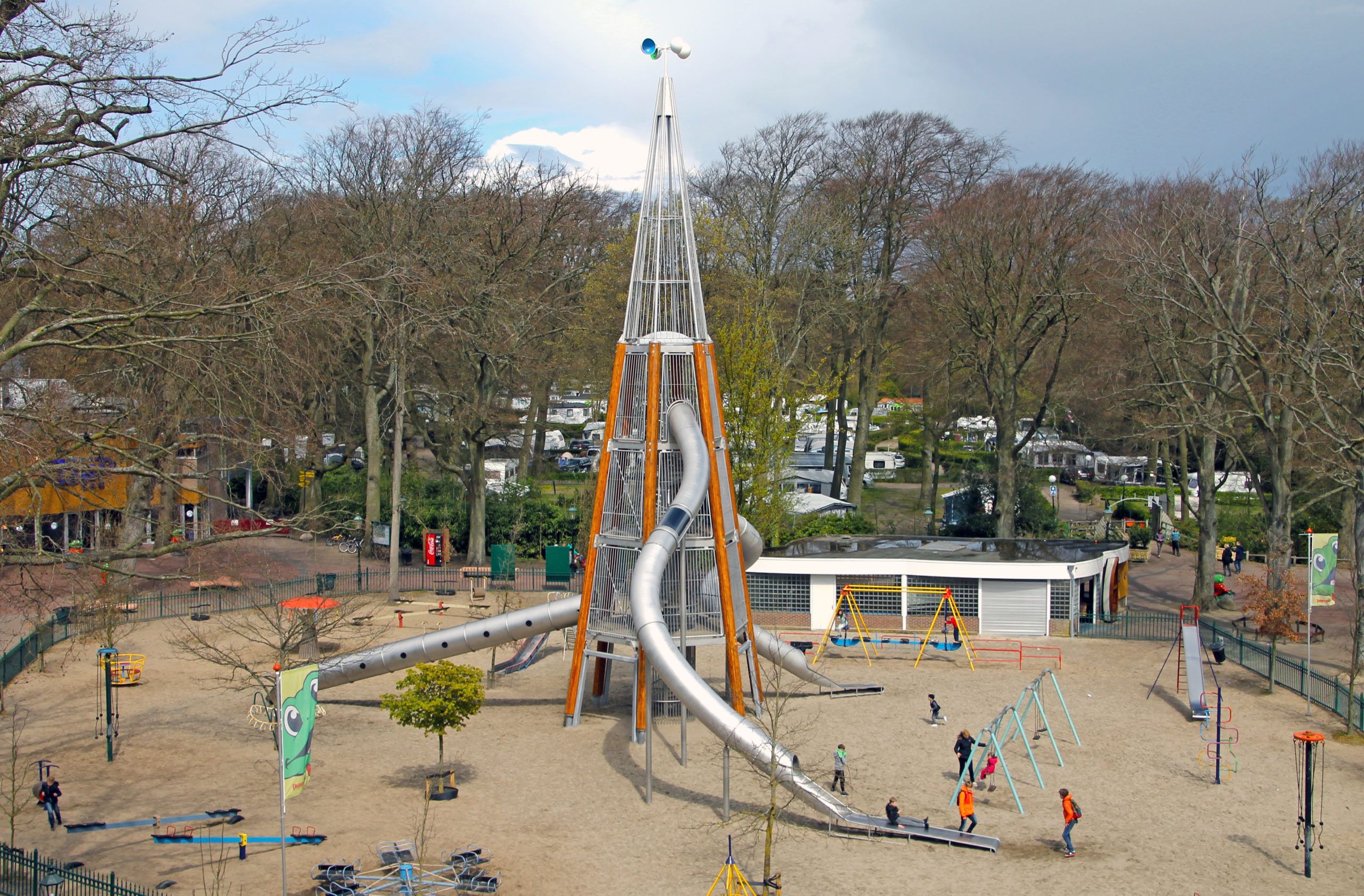 tall playground tower with slides