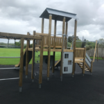 light brown wooden climbing frame in hawkley playground