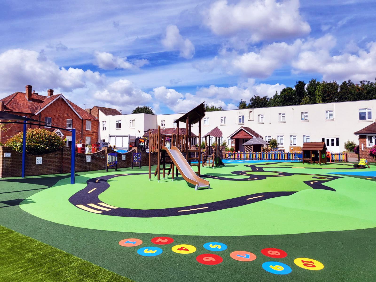 wet pour rubber in a school playground with graphics