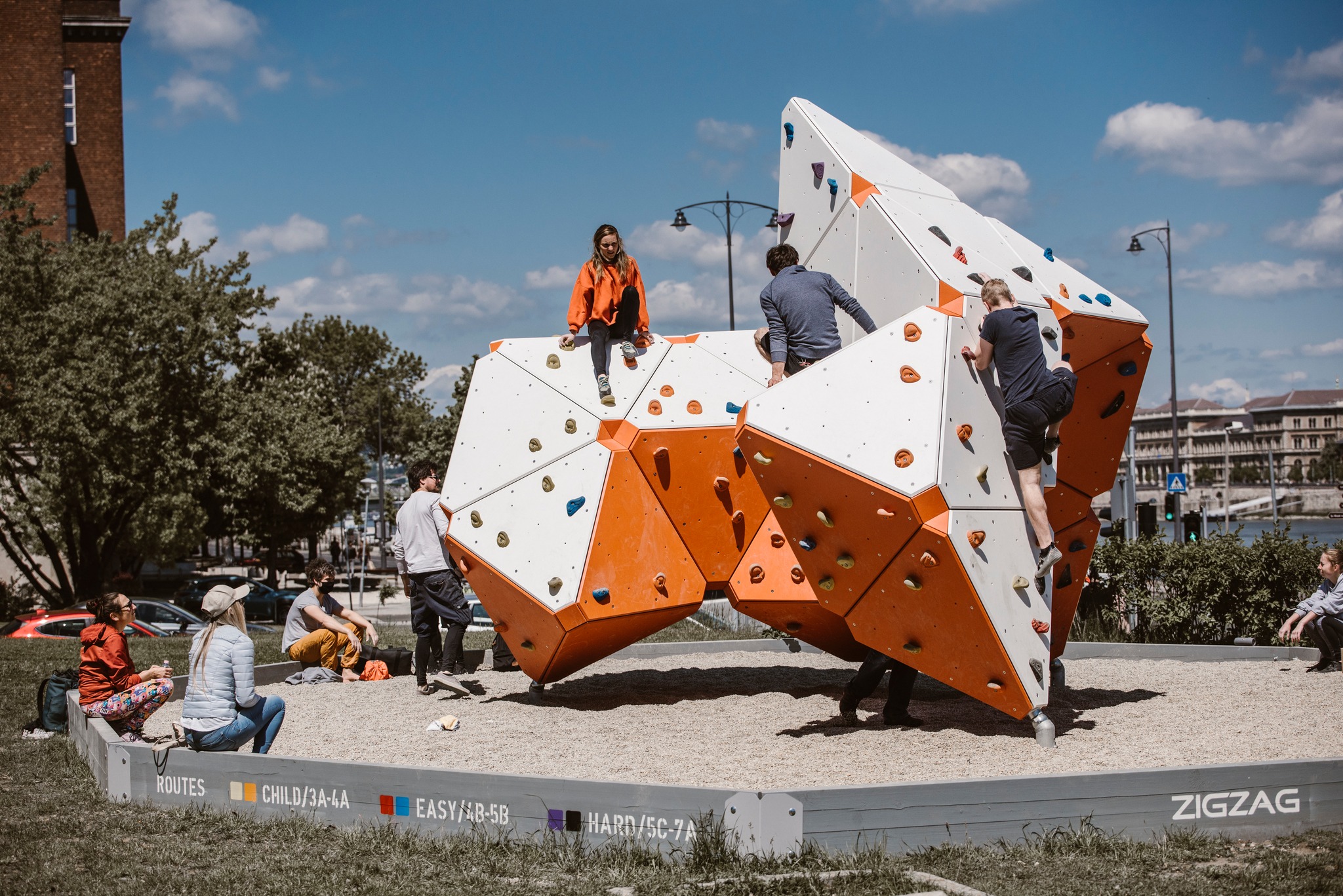 outdoor bouldering wall with marked routes
