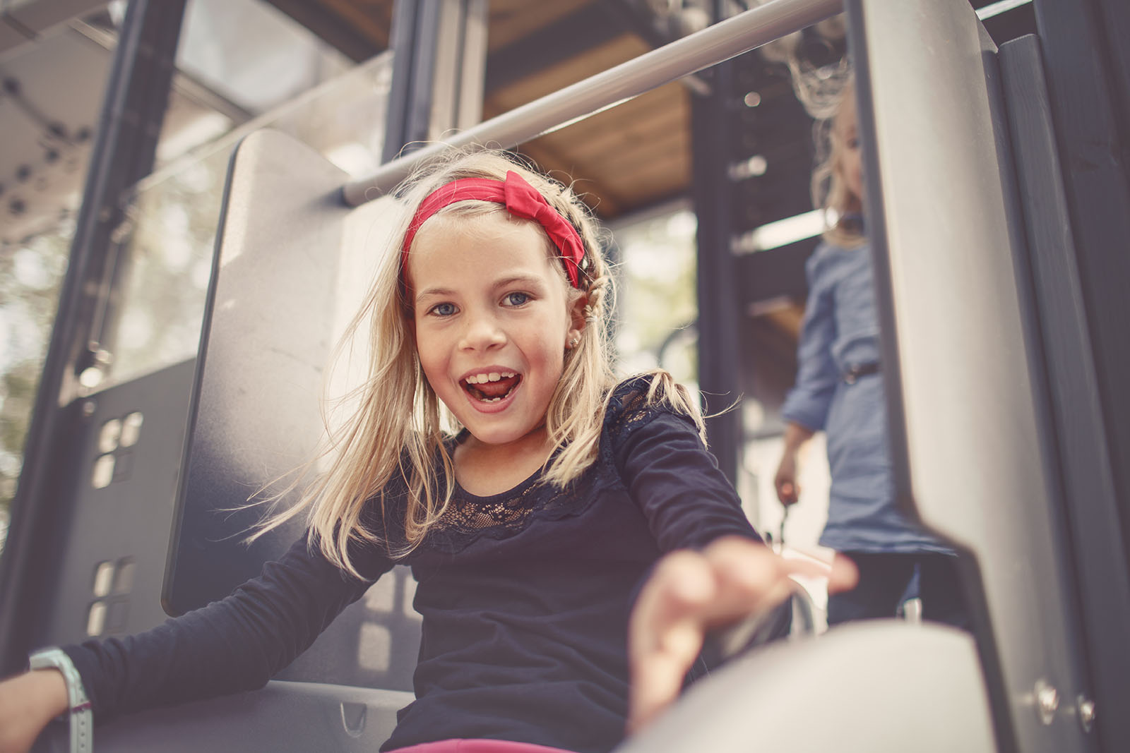 young girl enjoying a local Community playground