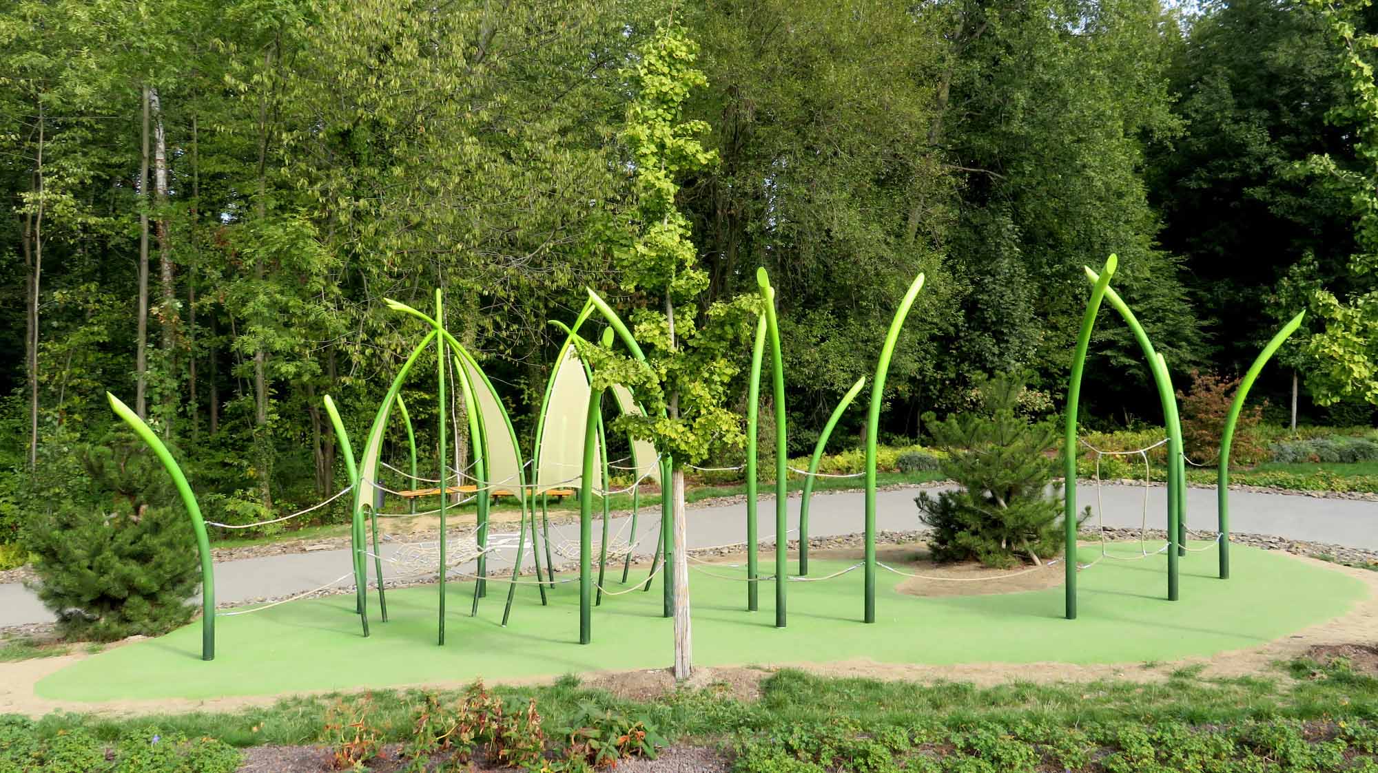 Lifelike grass texture on GrasArt playground equipment made from stainless steel.