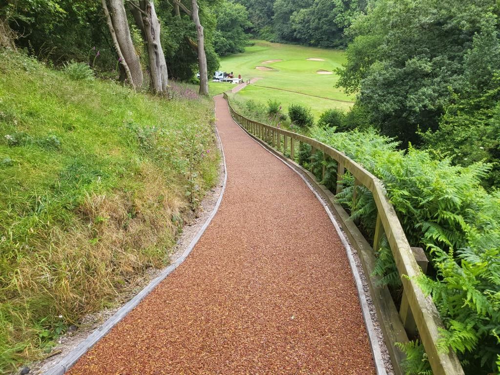 rubber mulch path going down a hill